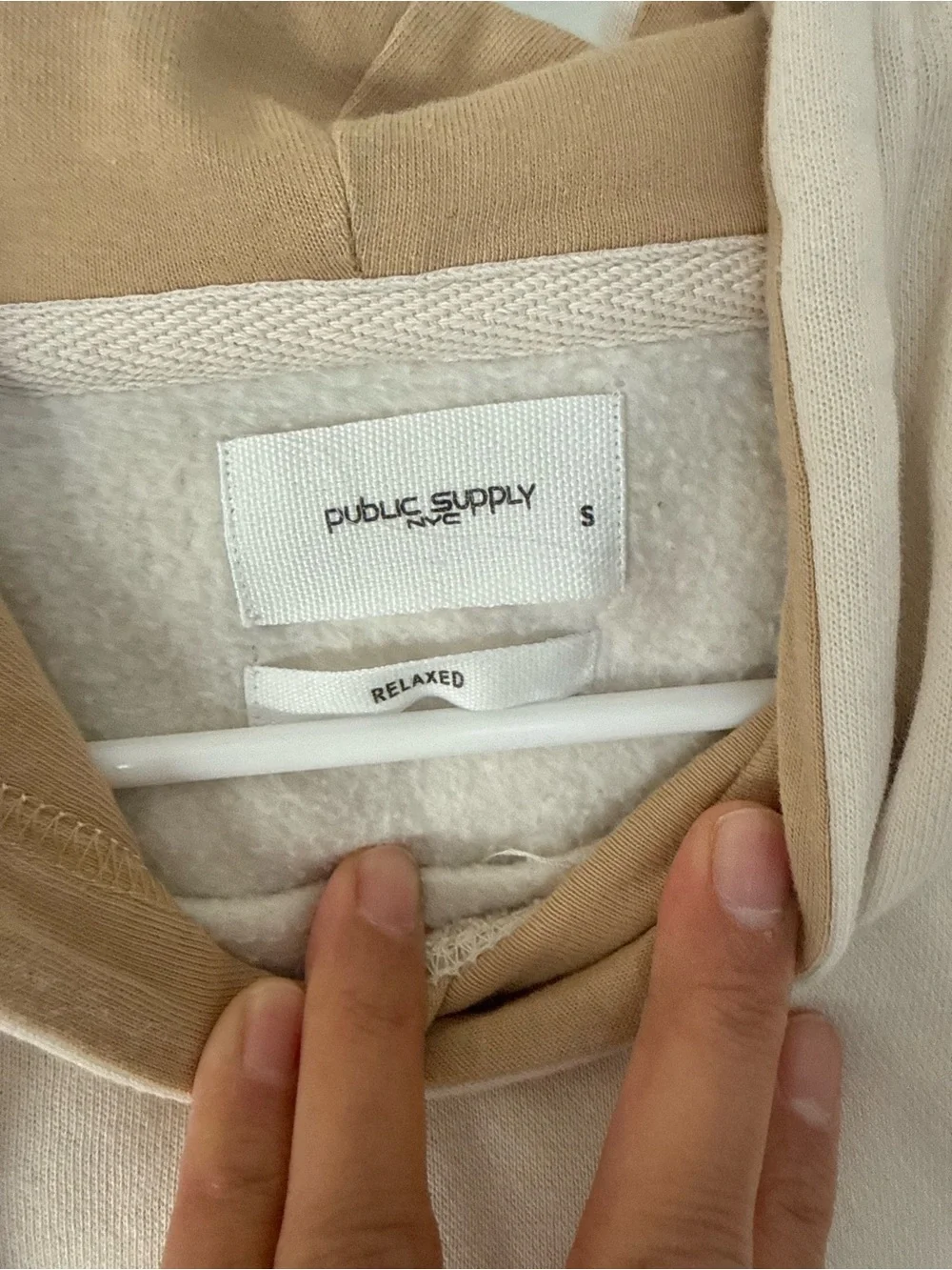 None cream hoodie